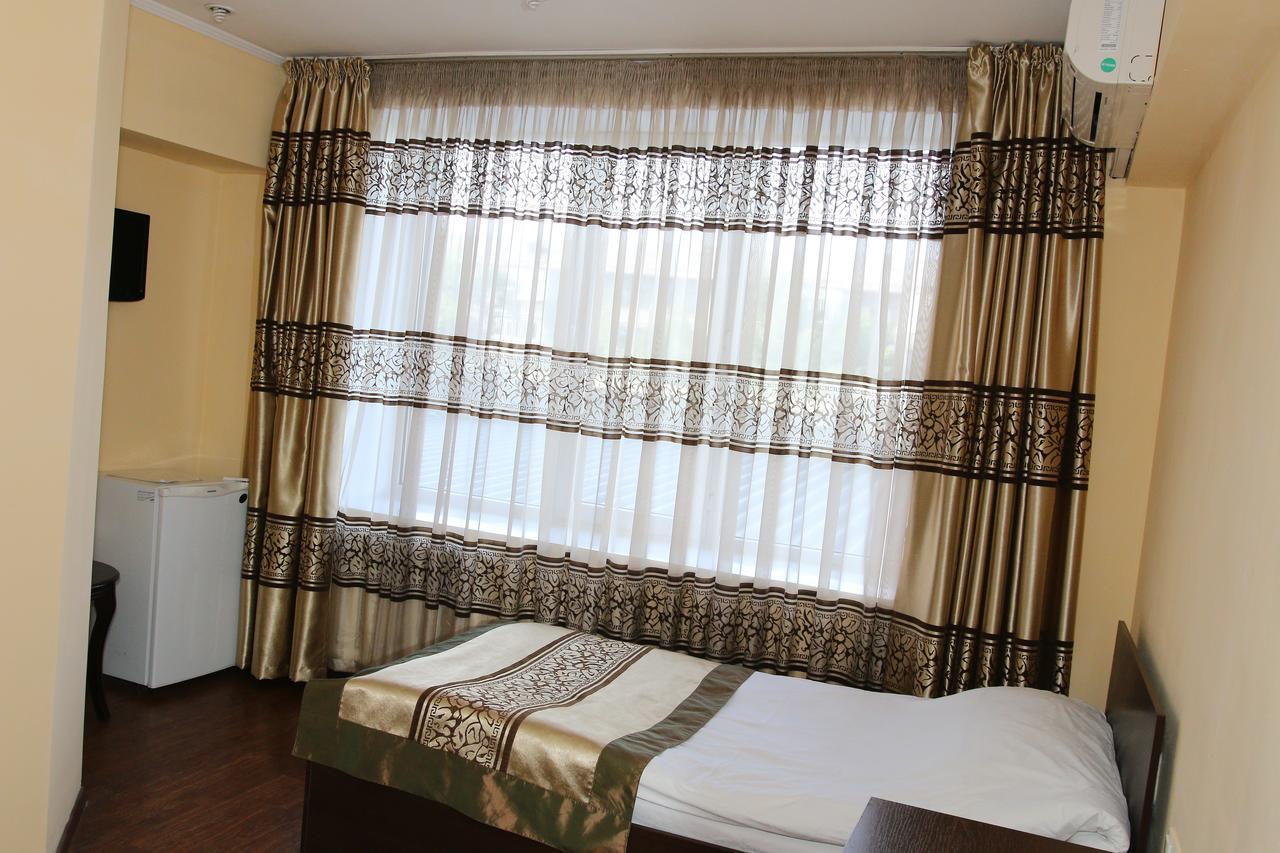 Kausar Hotel Almaty Chambre photo